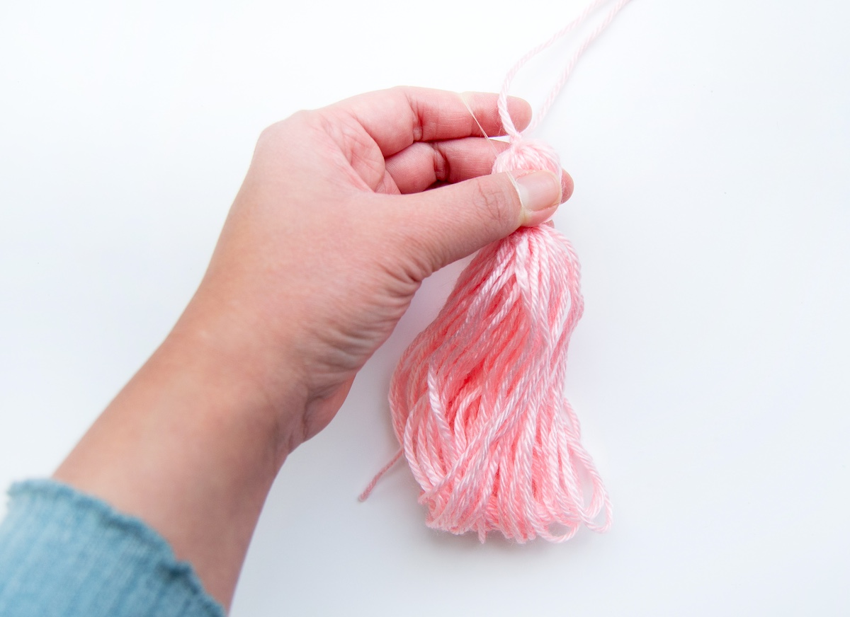Use Elastic to Tie Tassel
